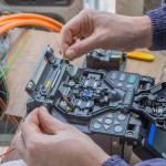 Technician working on network cabling